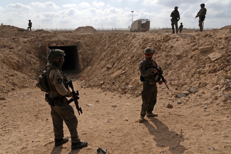 Israeli soldiers near the entrance to a tunnel near the Philadelphi corridor.