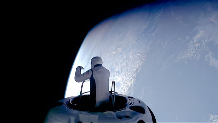 Polaris Dawn crew members performing their first private spacewalk. 