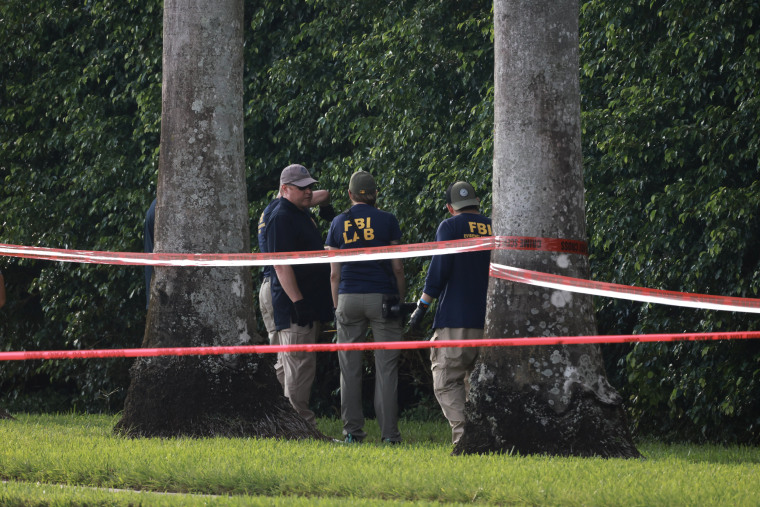 FBI agents investigate the area around Trump International Golf Club