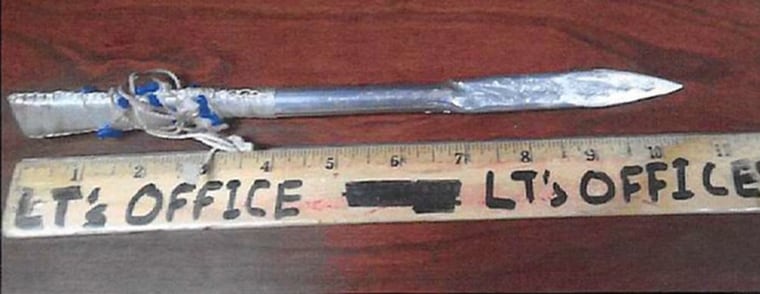 A metal object about 10.5 inches