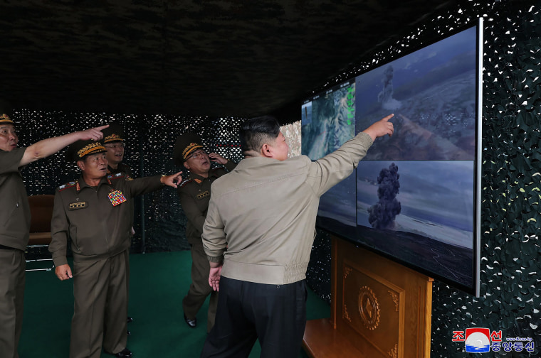 North Korea says it tested new ballistic missiles with super-large warhead