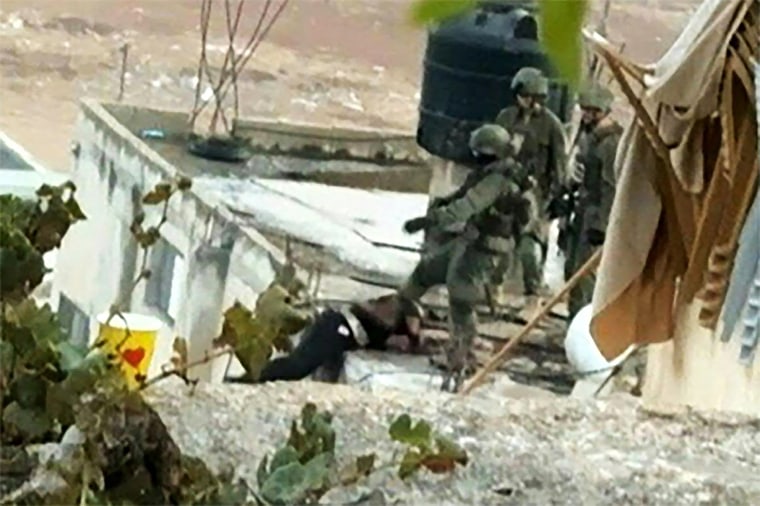 Israeli soldiers pushed bodies off a rooftop in the occupied West Bank