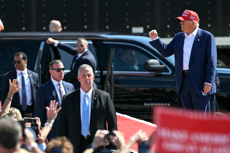 Image: donald trump secret service security protection politics political politician maga hat