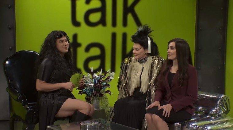 Bowen Yang as Charli XCX interviews Susanne Bartsch (Jean Smart) and Kaitlan Collins (Chloe Fineman).