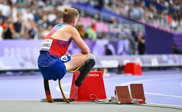 Hunter Woodhall of Team USA looks on after missing the podium in the Men's 100m T64.