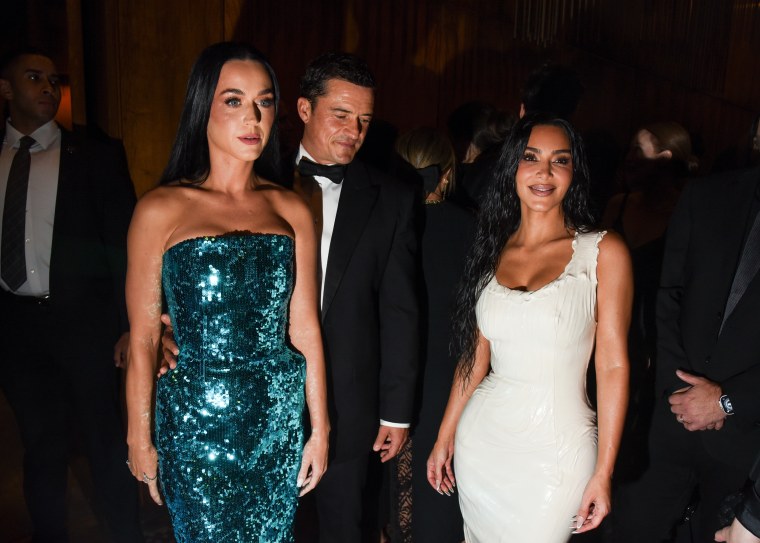 Katy Perry, Orlando Bloom and Kim Kardashian at the Kering Caring for Women Dinner during New York Ready to Wear Fashion Week held at The Pool on September 9, 2024 in New York, New York.  