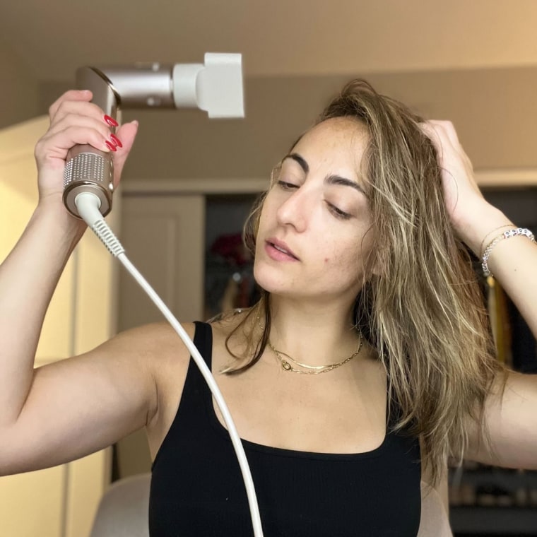 Audience development writer Danielle Murphy quick-drying her hair with the Shark FlexStyle.