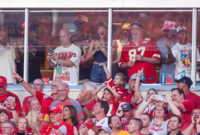 Taylor Swift cheers on Travis Kelce while sitting next to his father Ed Kelce on September 5. 