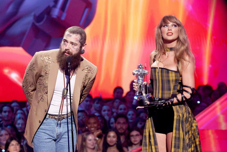 Post Malone and Taylor Swift accept the Best Collaboration award for "Fortnight."