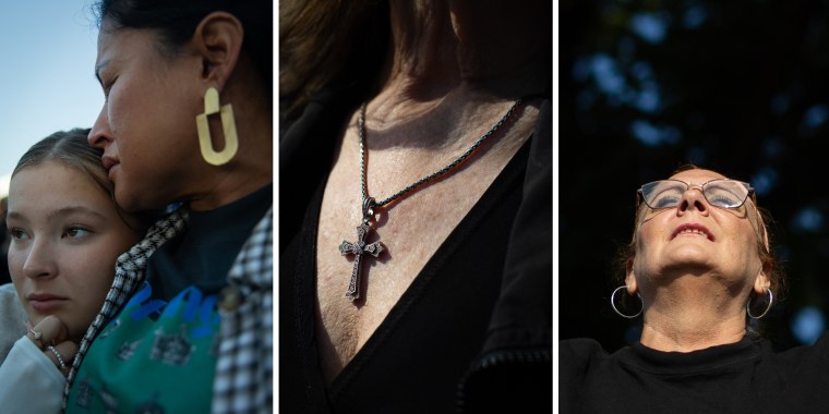 Nina Porter, left, prays with her daughter Genesis while Lou Engle speaks. Patty Miller, from Owego, NY, prays during the “A Million Women” rally on Saturday. 

