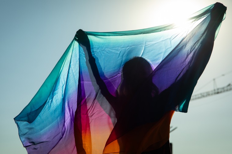 From the stage Saturday, a speaker at the “A Million Women” rally said she was praying for the salvation of "the rainbow people" — those "still trapped in LGBTQ," she said.