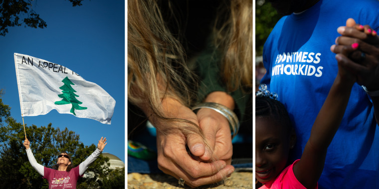 Susan Marsh, left, of Maryland, prays while holding an Appeal to Heaven flag. Supporters of Don’t Mess With Our Kids, an anti-LGBTQ+ conservative group, turned out in droves. Shed Curry holds his 6-year-old daughter, Ariana.
