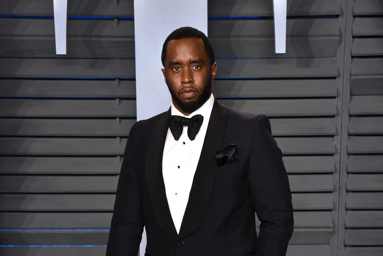 Sean Combs poses for a photo