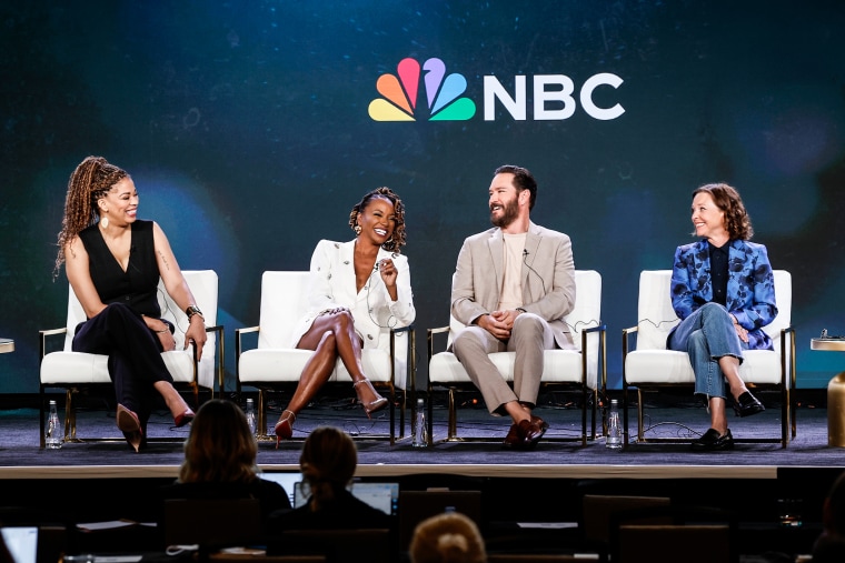 From left, Nkechi Okra Carroll, Shanola Hampton, Mark-Paul Gosselaar and Kelli Williams sit on stage during a panel discussion