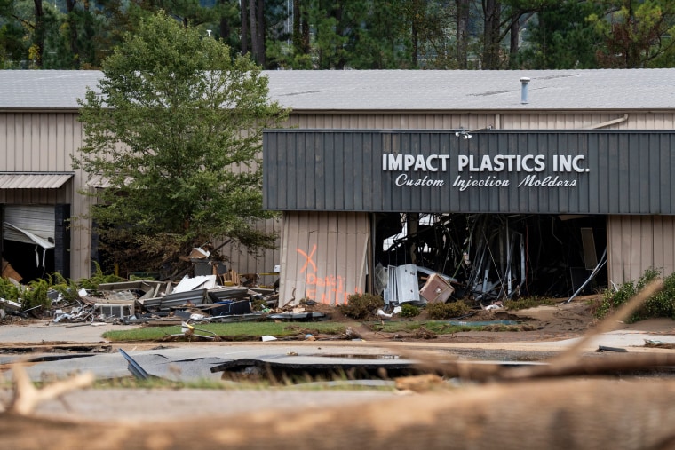 Impact Plastics Inc. surrounded by mud and debris