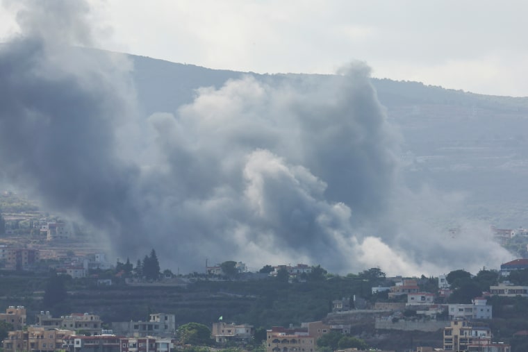 Smoke billows amid the ongoing hostilities between Hezbollah and Israeli forces, as seen from Tire