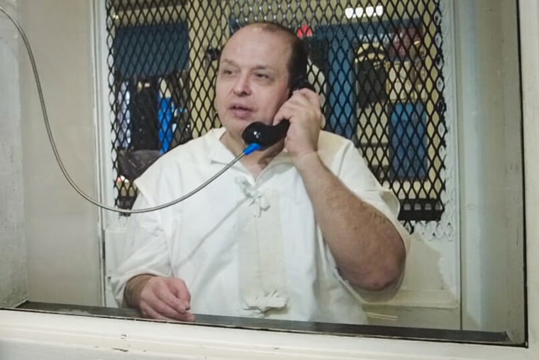 Robert Roberson is on the phone in prison