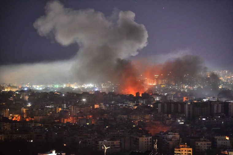 Smoke rises from the site of an Israeli airstrike that targeted a neighborhood in Beirut's southern suburbs 