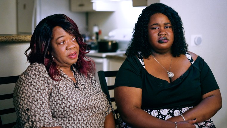 La'Tania Banks, left, and Lelah Banks sit side by side as La'Tania speaks