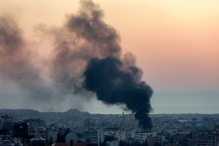 Smoke rises from the site of an Israeli airstrike in Beirut's southern suburbs on Oct. 8, 2024.