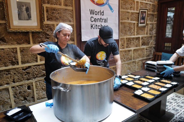 Aline Kamakian the owner of Beirut's Mayrig restaurant, serves food to the displaced.