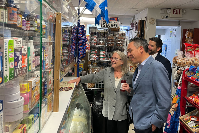 Wild and Democratic Caucus Chairman Pete Aguilar, center, next to El Mercadito Grocery in downtown Allentown.