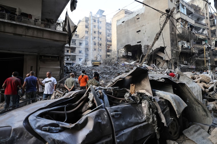 An Israeli air strike killed at least 22 people in central Beirut on October 10, as Israeli ground troops in Lebanon were accused of firing on the UN's peacekeeping headquarters, injuring two Blue Helmets.