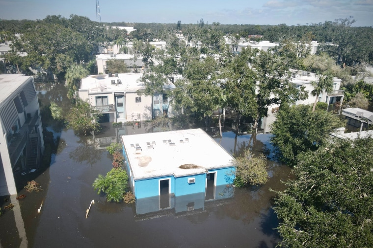 An aerial of 2690 Apartments in floodwater