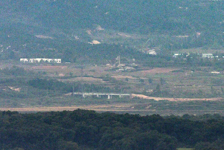 In this image taken from Paju, a mound of dirt is piled up near a structure on the Gyeongui Line road in the northern area of ​​the Demilitarized Zone (DMZ) that separates the two Koreas