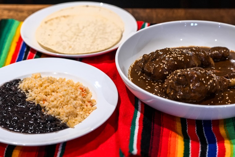 Olin Restaurant serves chicken tenders with rice, beans and tortillas. The recipe is from Jonathan's grandmother and they import the seasonings from Mexico.