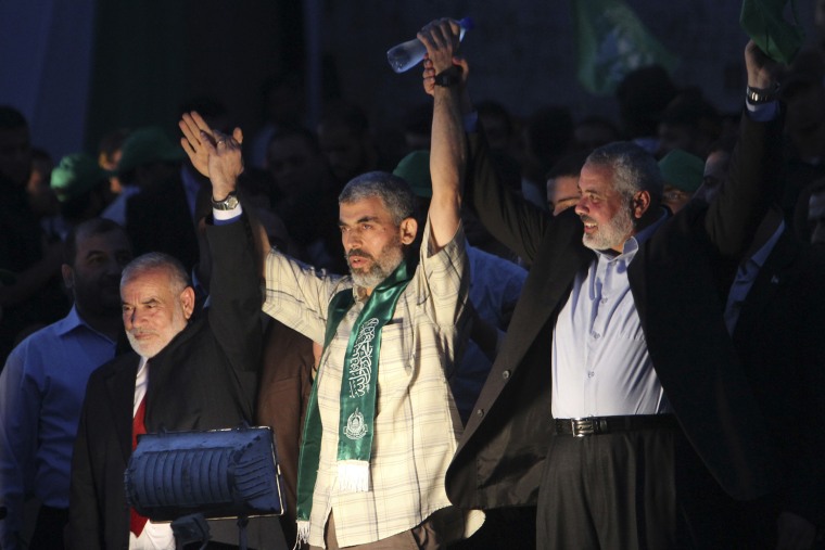 Sinwar, a founder of Hamas' military wing, told the crowd that Palestinian militant groups must win freedom for the remaining prisoners by "all necessary means. 