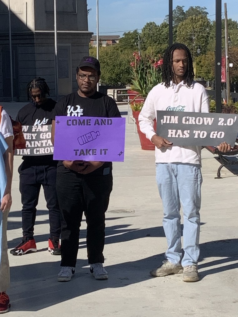 Demonstrators at a voting rights rally at Morehouse College on Saturday.