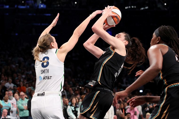 Breanna Stewart of the New York Liberty shoots while Alanna Smith of the Minnesota Lynx defends in Game 5 of the WNBA Finals