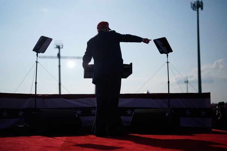 Trump ducked and was carried off the stage after loud noises were heard after he began speaking. 