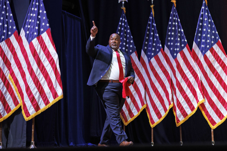 North Carolina Governor Mark Robinson takes the stage at an event for former President Donald Trump on August 14, 2024 in Asheville, NC.