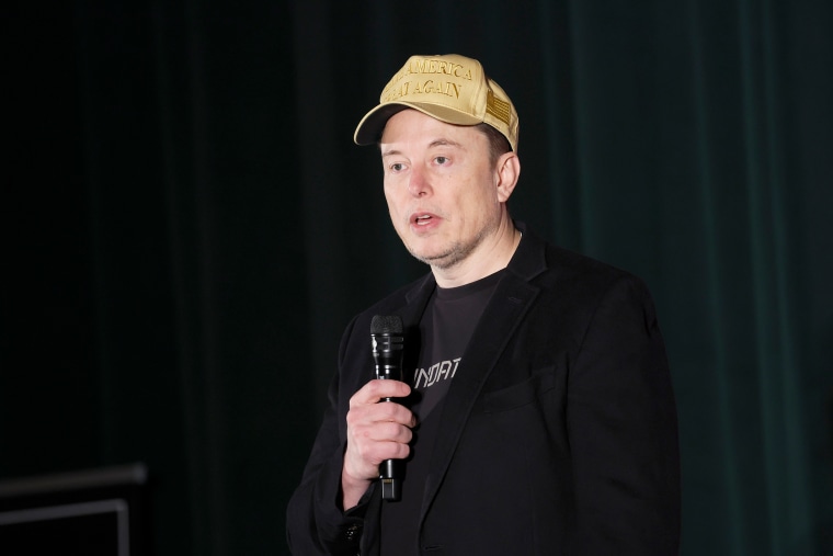 Image: Elon Musk Holds Town Hall With Pennslyvania Voters gold maga hat politics political