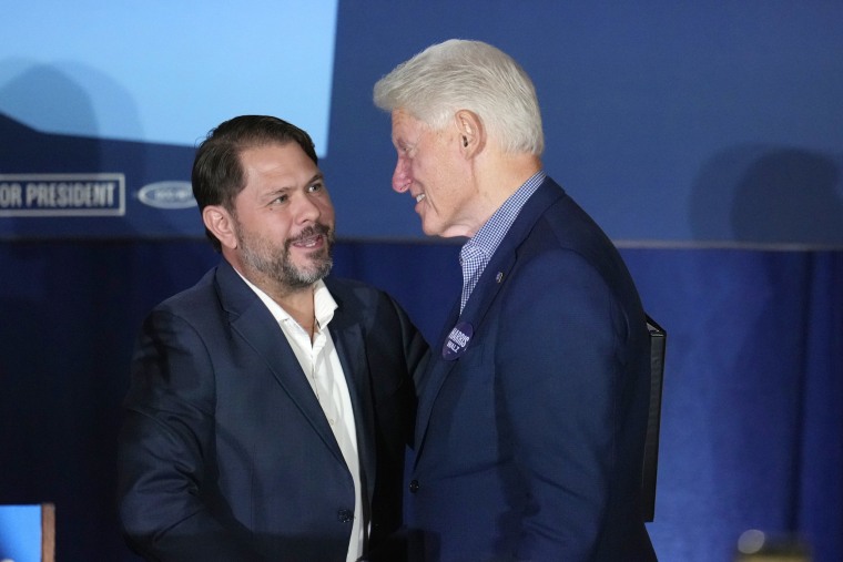 Former President Bill Clinton speaks with Rep. Ruben Gallego 