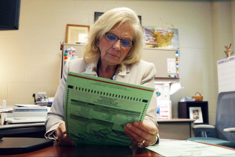 Sheryl Guy looks at the bulletin