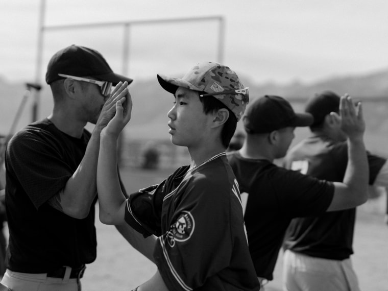 Players congratulating each other at the end of the exhibition game.