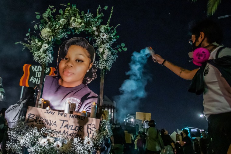 A photo of Breonna Taylor at a march