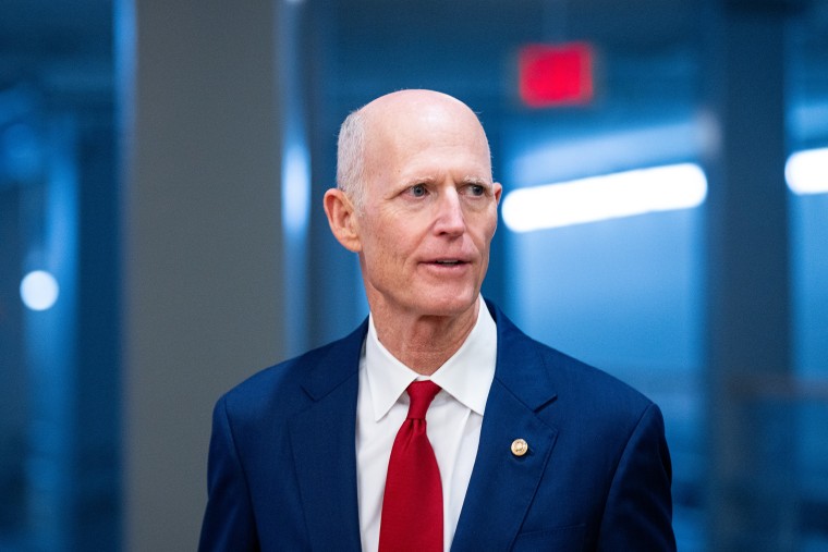 Rick Scott arrives at the Capitol to vote