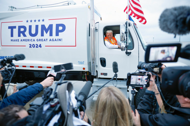 Photo: Donald Trump campaigning with a garbage truck in Wisconsin, politics, politician