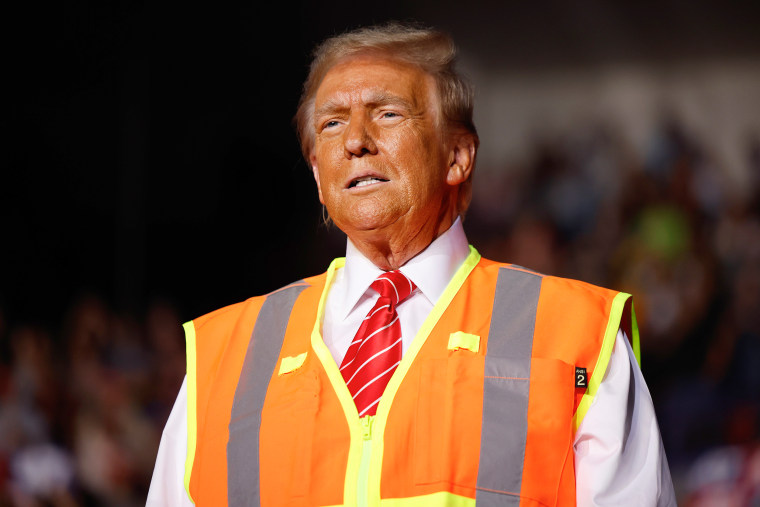 Image: Donald Trump Campaigns In The Swing State Of Wisconsin orange vest politics political politician