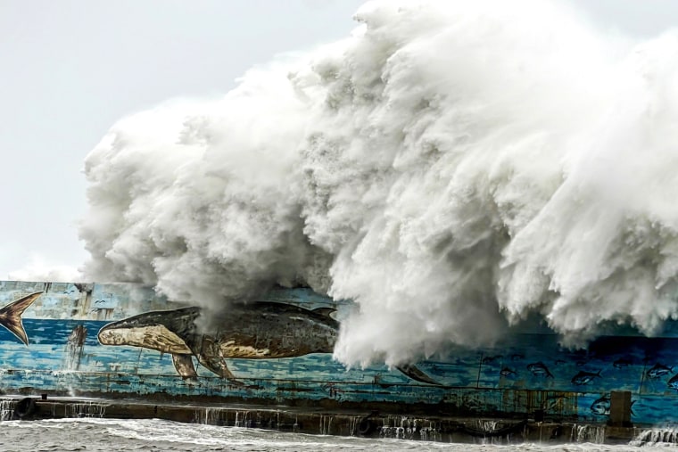 Fierce winds and heavy rain battered Taiwan on October 31 as Super Typhoon Conley approached, forcing thousands of people to evacuate from one of the most powerful storms to threaten the island in years. 