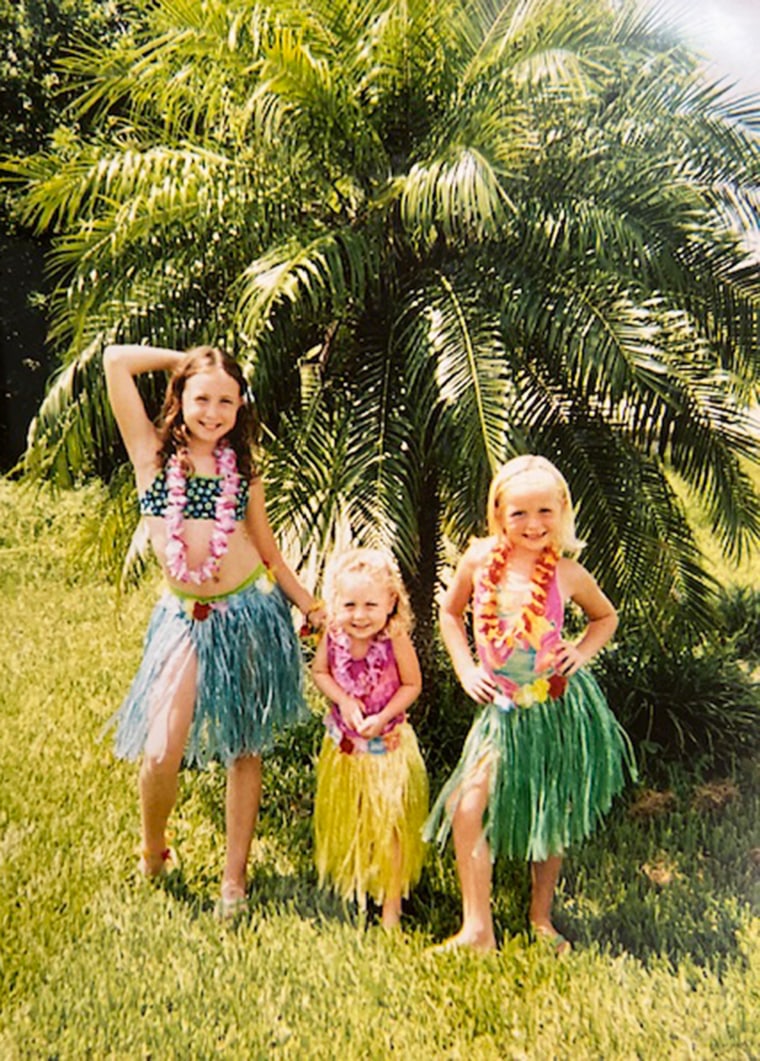 My three girls in Hawaiian dance costumes.