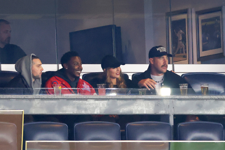 Jerrod Carmichael, Taylor Swift and Travis Kelce at the Yankees game.