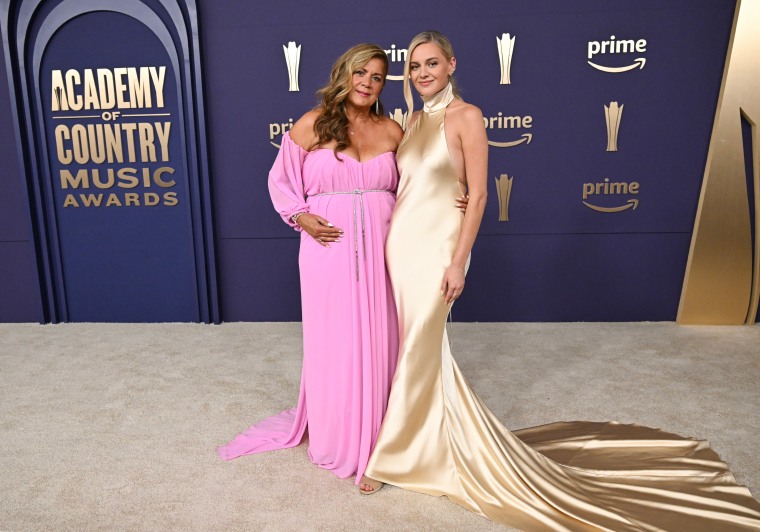 Carla Denham and Kelsea Ballerini attend the 59th Academy of Country Music Awards at Ford Center.