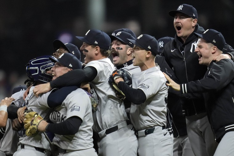 The New York Yankees celebrate the 2024 AL pennant win.