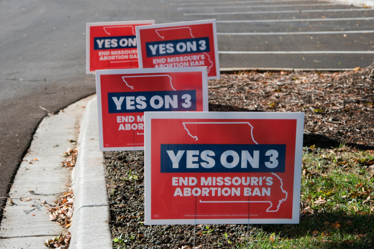 “Yes on 3” signs