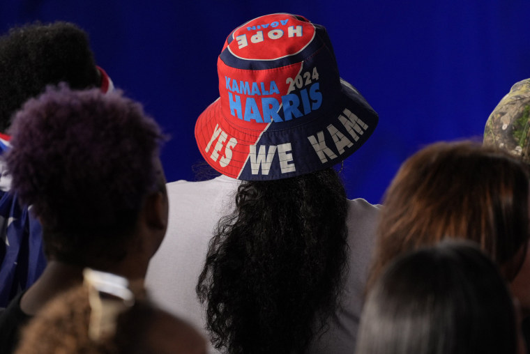 A supporter wearing a bucket hat for Democratic presidential nominee Vice President Kamala Harris, attends a campaign rally, Saturday, Nov. 2, 2024, at the PNC Music Pavilion in Charlotte, N.C. 